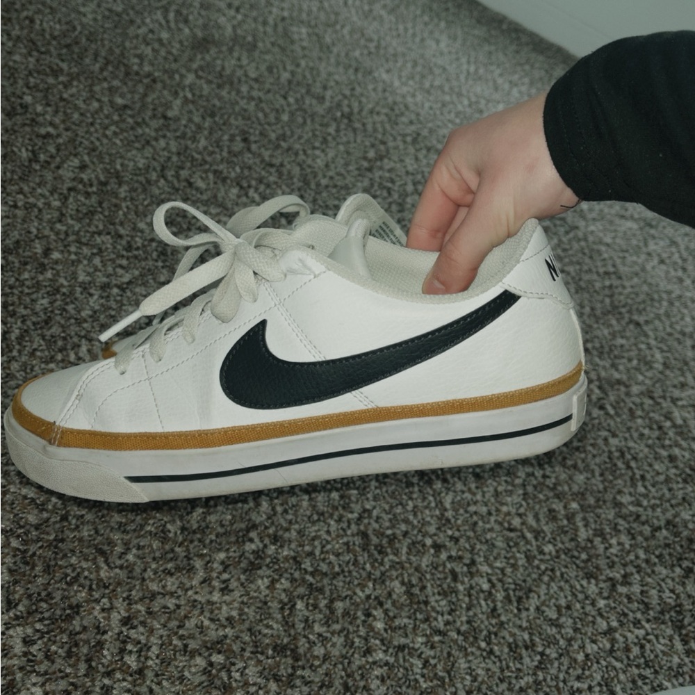 Nike women’s White and Black Sneakers